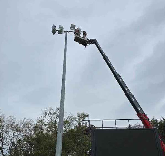 Changing the globes at the Mount Lofty Sports Club